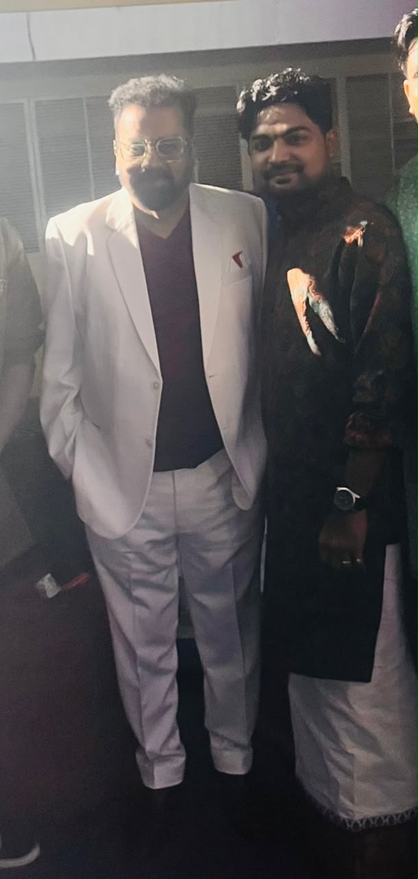 Akhil with a distinguished guest backstage
